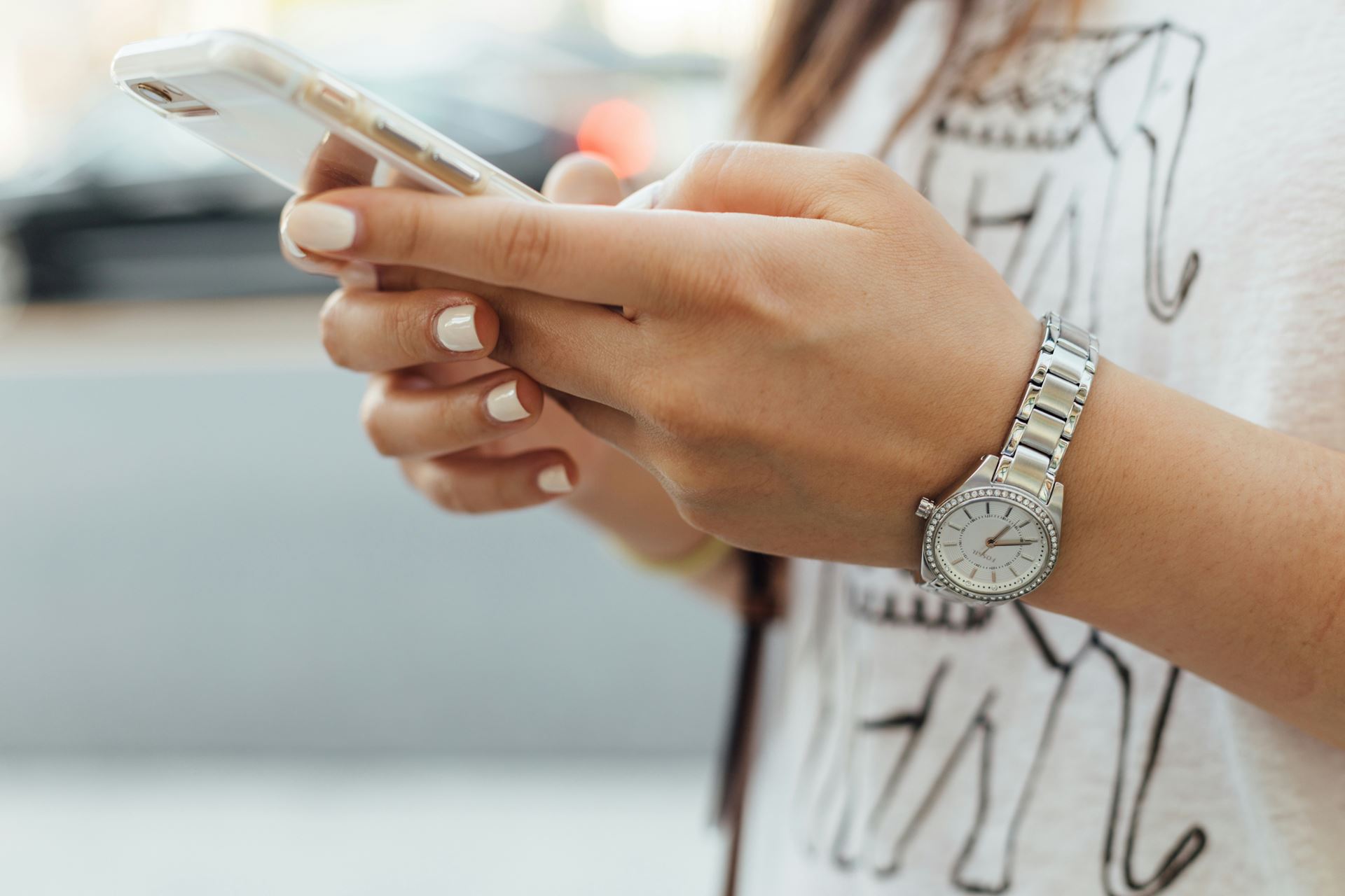 Person holding mobile phone